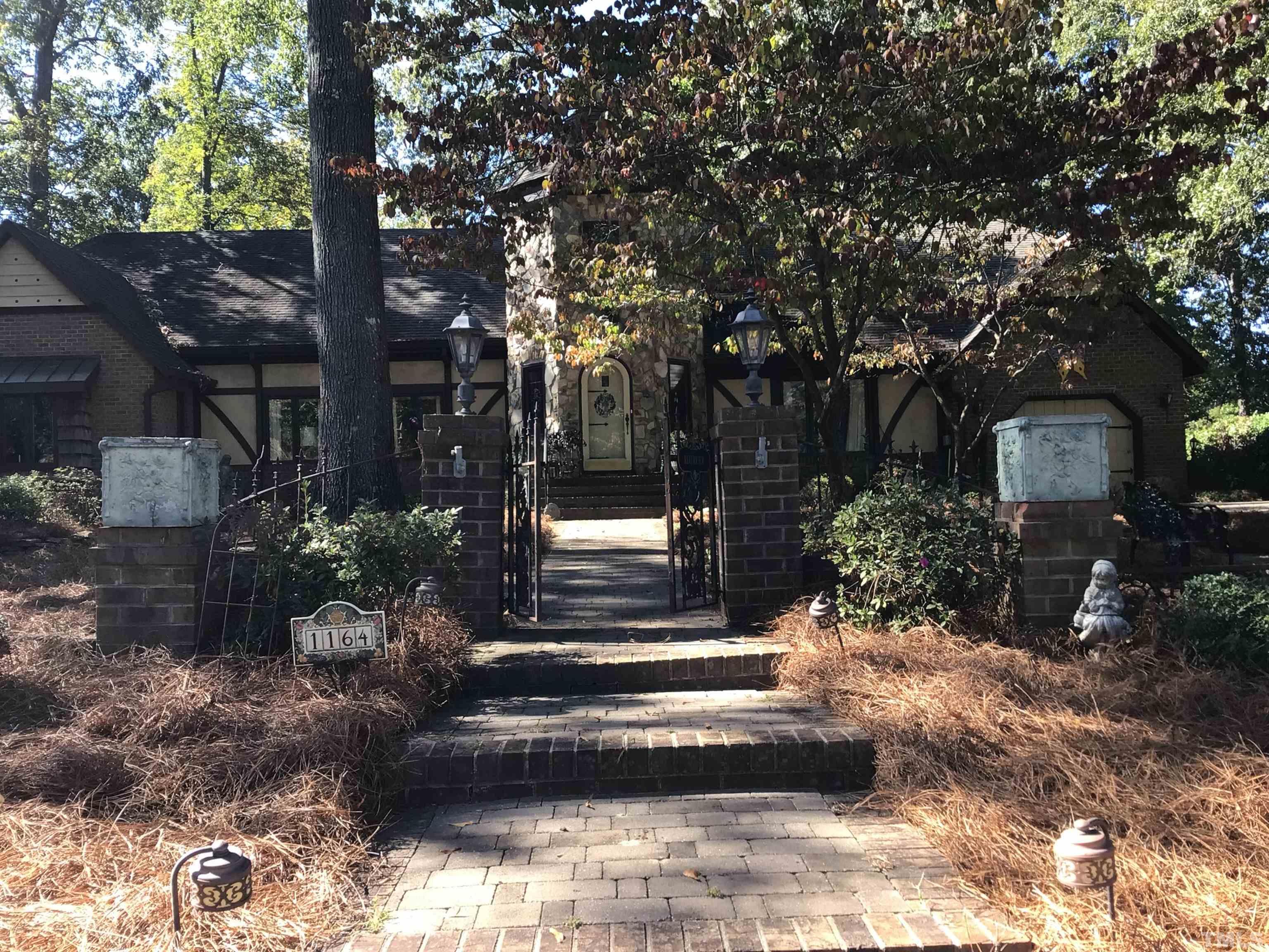 1164 Keith Hills Road Lillington, NC 27546 - Photo 11 of 47 a front view of a house with a yard