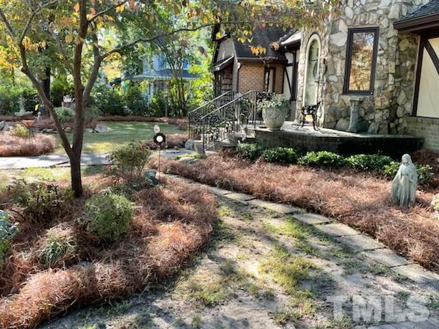 1164 Keith Hills Road Lillington, NC 27546 - Photo 14 of 47 a view of a garden with a house