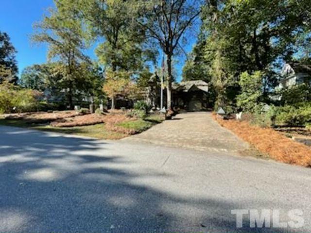 1164 Keith Hills Road Lillington, NC 27546 - Photo 18 of 47 a view of a house with a yard