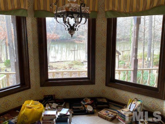 1164 Keith Hills Road Lillington, NC 27546 - Photo 25 of 47 a living room with furniture and a window