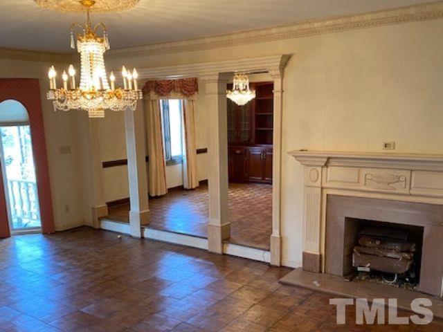 1164 Keith Hills Road Lillington, NC 27546 - Photo 34 of 47 a view of a livingroom with wooden floor and a fireplace