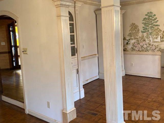 1164 Keith Hills Road Lillington, NC 27546 - Photo 36 of 47 a view of a hallway with wooden floor and staircase