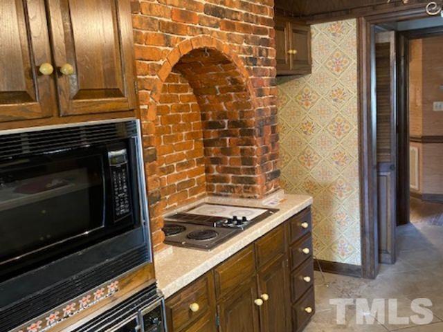 1164 Keith Hills Road Lillington, NC 27546 - Photo 41 of 47 a bathroom with a sink and a mirror