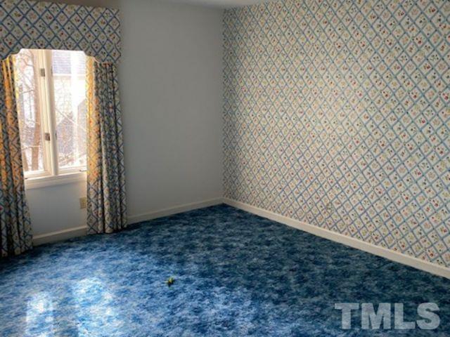 1164 Keith Hills Road Lillington, NC 27546 - Photo 45 of 47 an empty room with a window