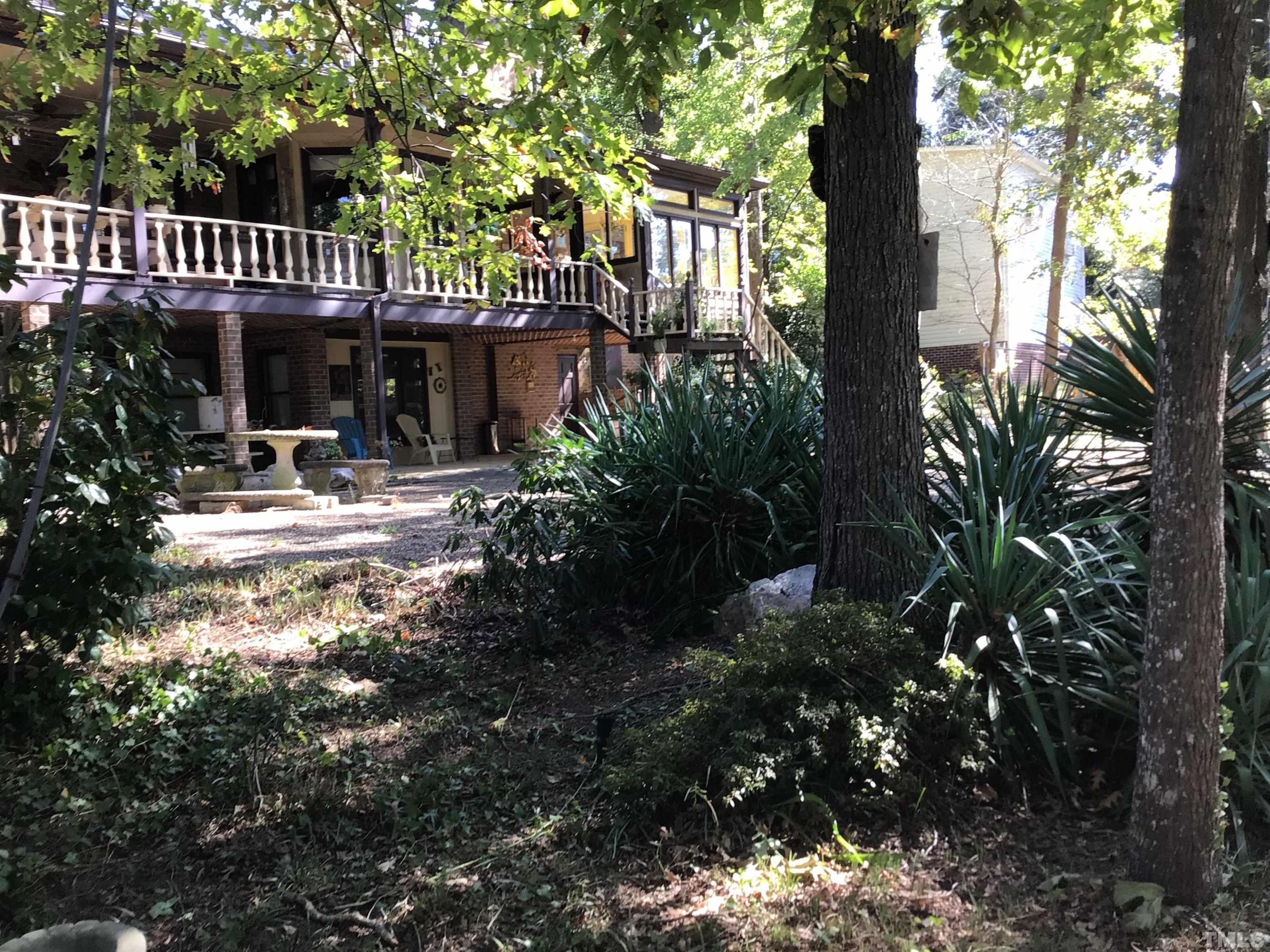 1164 Keith Hills Road Lillington, NC 27546 - Photo 6 of 47 a front view of a house with garden