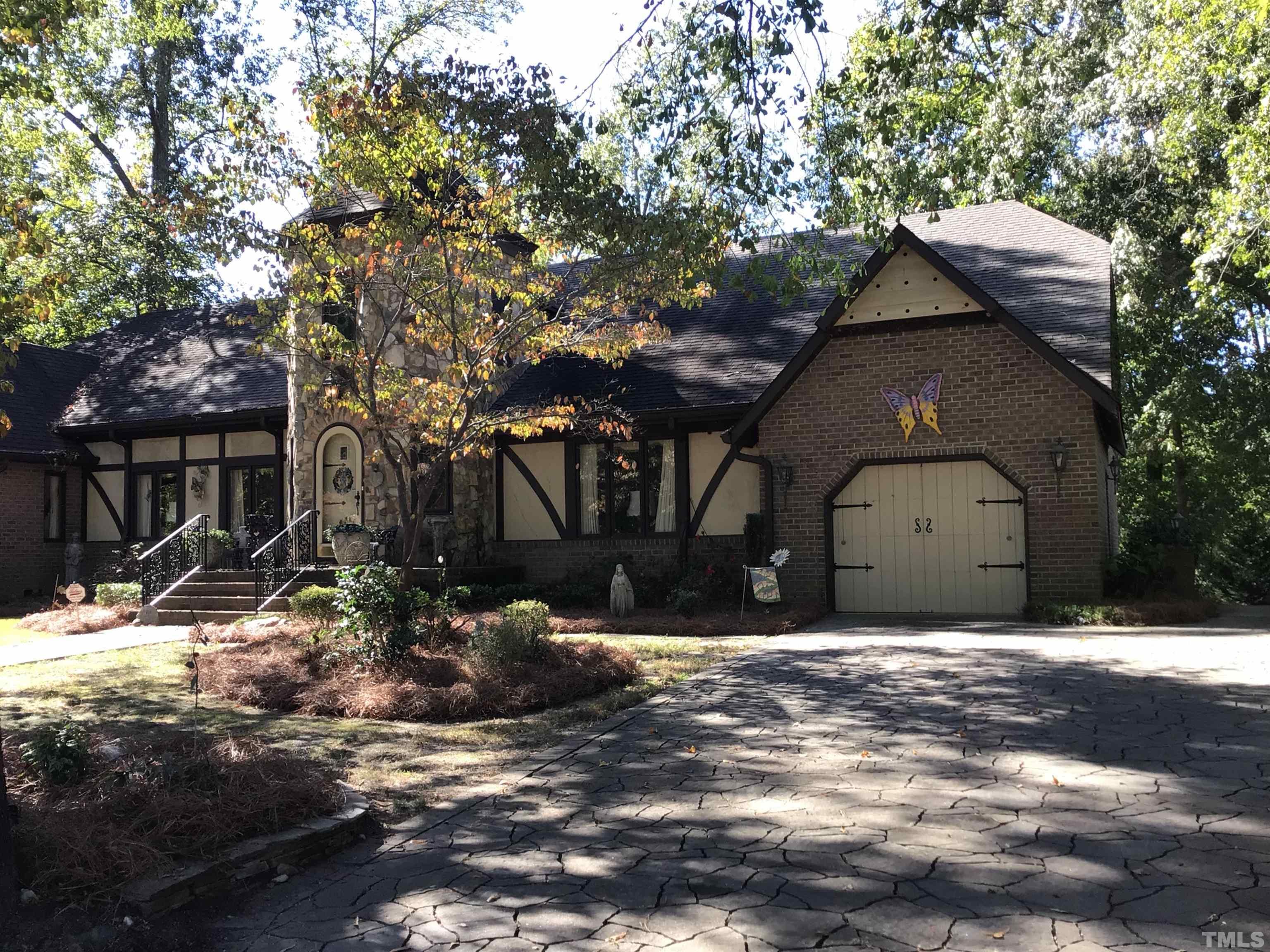 1164 Keith Hills Road Lillington, NC 27546 - Photo 10 of 47 a front view of a house with a yard
