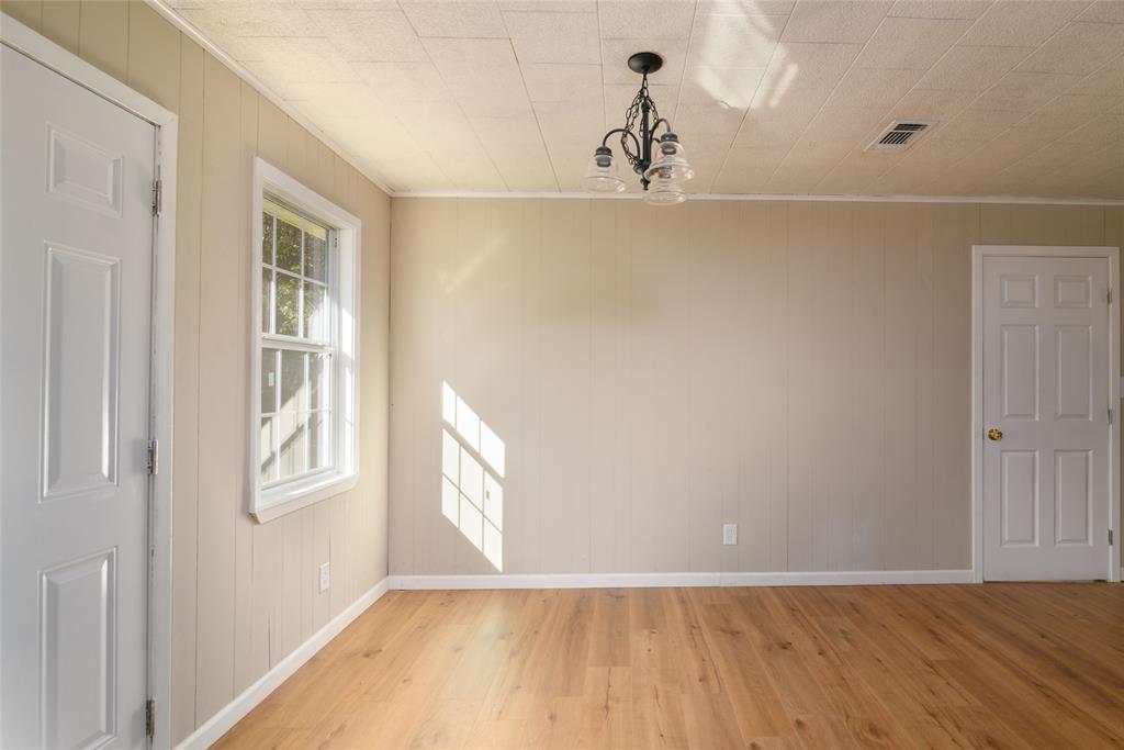 1456 Cooper Street Saline, LA 71070 - Photo 11 of 24 a view of an empty room with a window