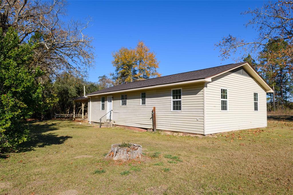 1456 Cooper Street Saline, LA 71070 - Photo 24 of 24 a view of a house with a yard