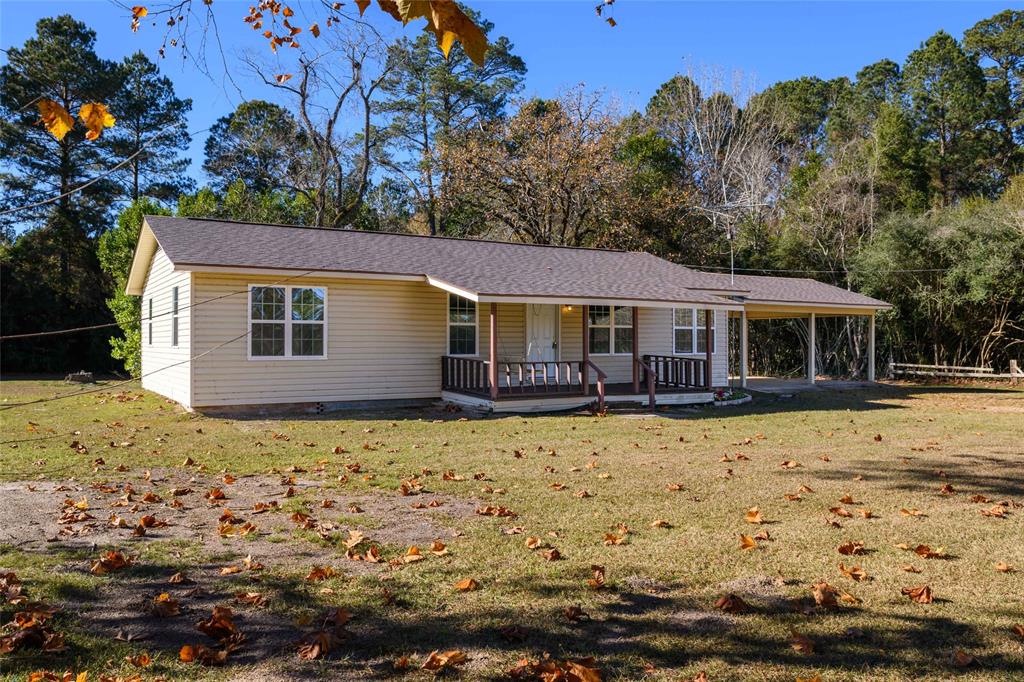 1456 Cooper Street Saline, LA 71070 - Photo 3 of 24 a front view of a house with a yard