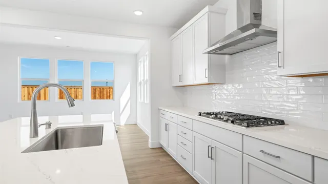 a view of an empty room with cabinet