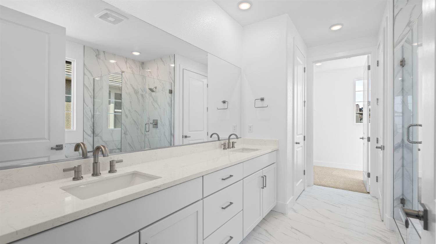 787 Lorca Street Mountain House, CA 95391 - Photo 25 of 36 a spacious bathroom with a double vanity sink mirror and shower