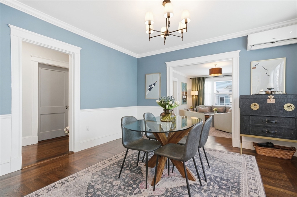 13 Roslyn Street, Unit 2 Salem, MA 01970 - Photo 12 of 26 a view of a dining room with furniture and wooden floor