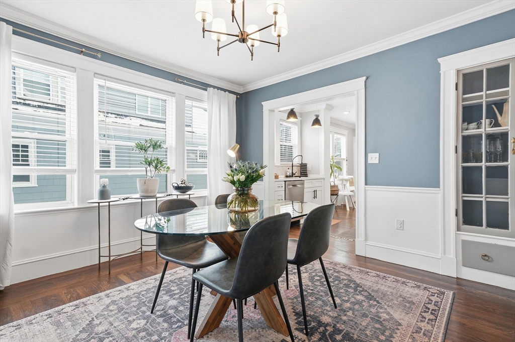13 Roslyn Street, Unit 2 Salem, MA 01970 - Photo 13 of 26 a view of a dining room with furniture window and wooden floor