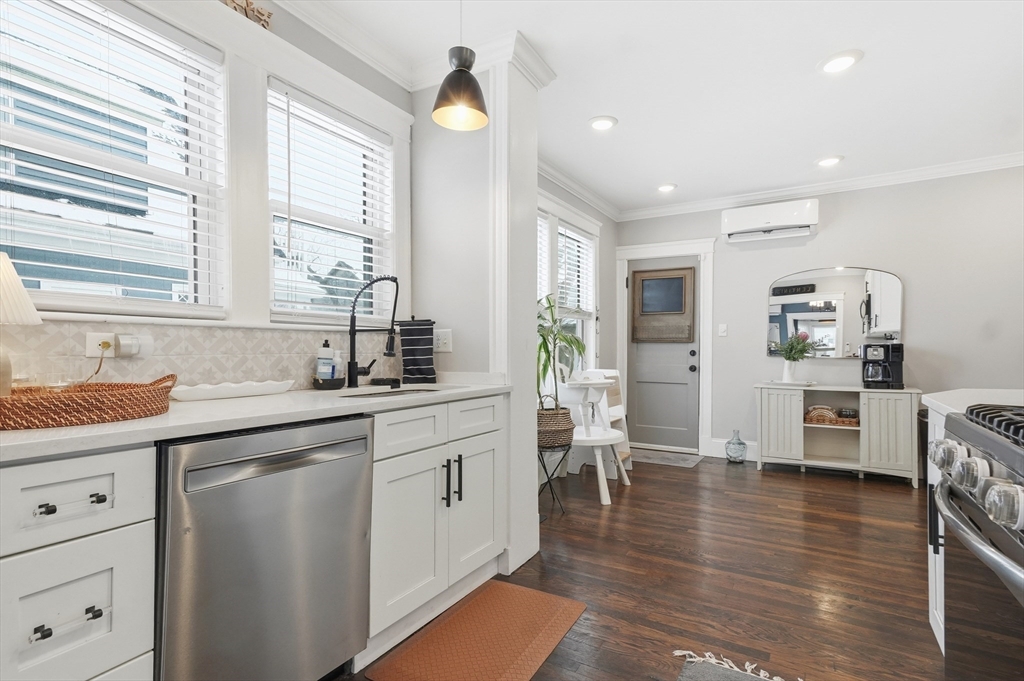 13 Roslyn Street, Unit 2 Salem, MA 01970 - Photo 10 of 26 a kitchen with stainless steel appliances granite countertop a sink and cabinets