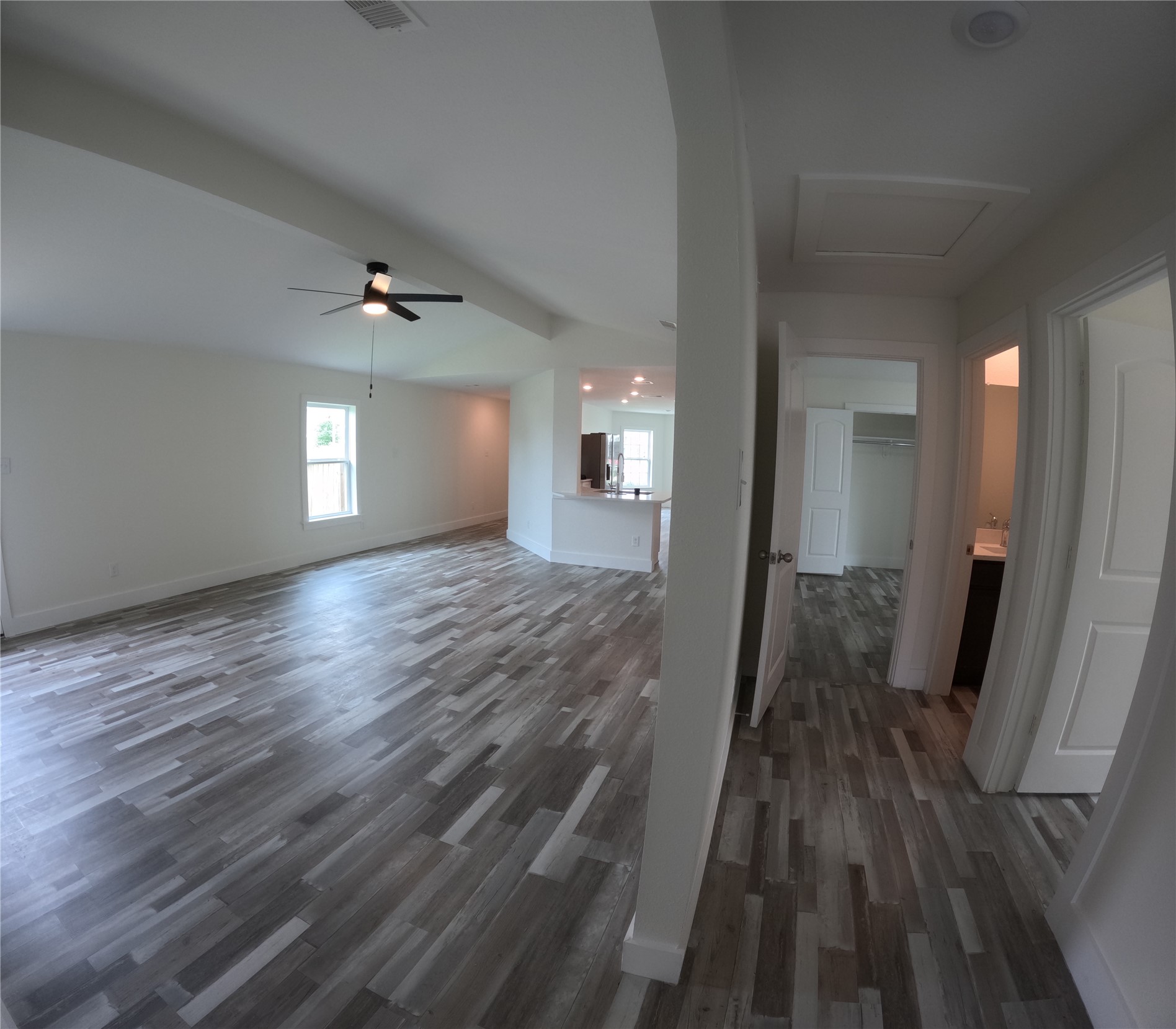 8419 Hannah Rd Cove Cove, TX 77523 - Photo 23 of 28 a view of a hallway with wooden floor and staircase