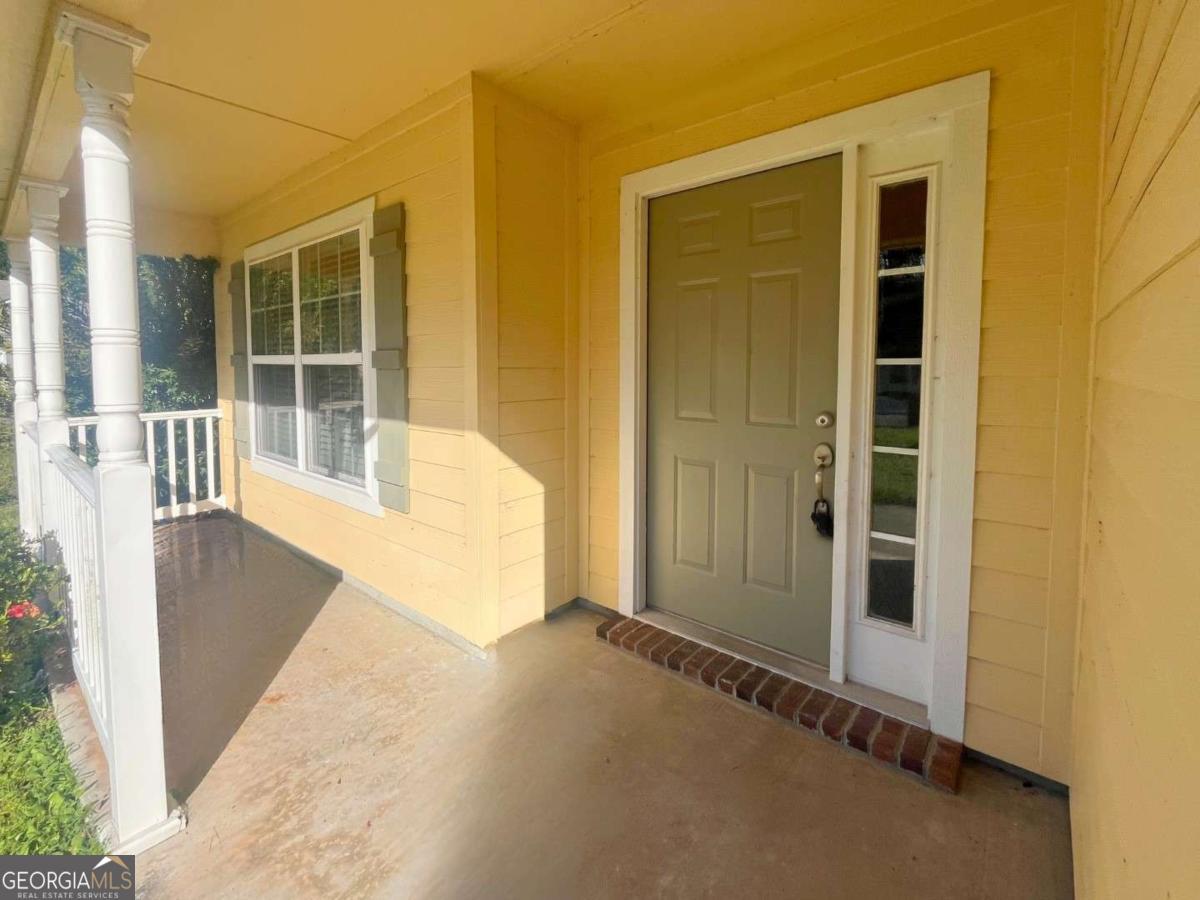 303 Gary Circle St. Marys, GA 31558 - Photo 2 of 42 a view of front door of house