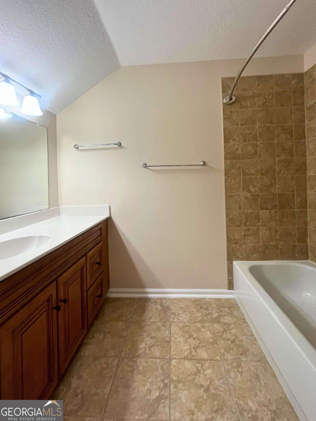 303 Gary Circle St. Marys, GA 31558 - Photo 25 of 42 a bathroom with a sink a toilet and bathtub