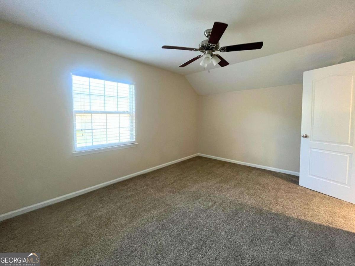 303 Gary Circle St. Marys, GA 31558 - Photo 28 of 42 a view of an empty room with a window