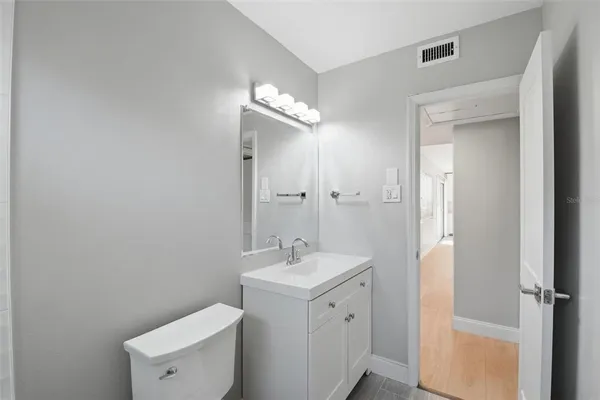 a view of an empty room with a window