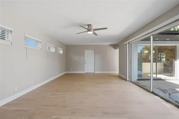 a view of an empty room with a window