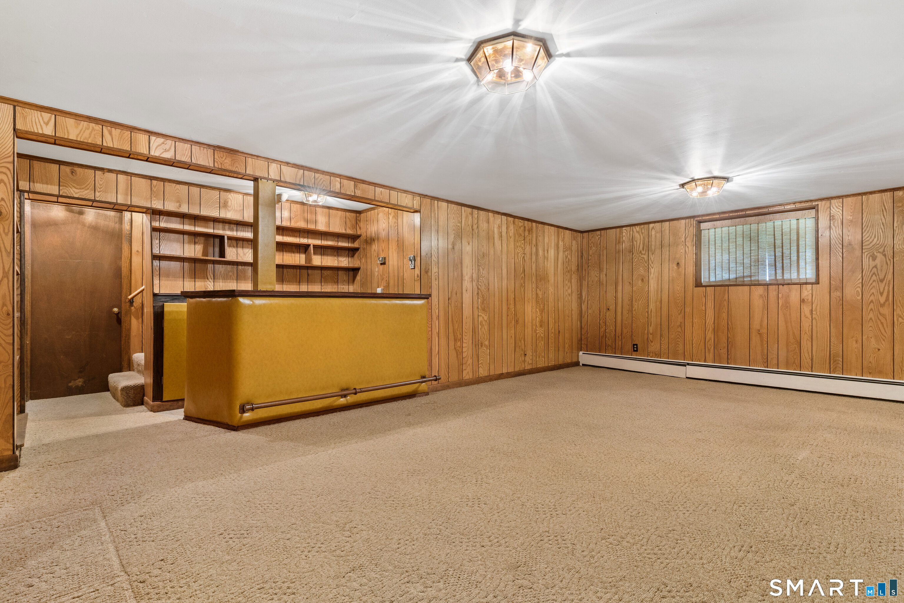 251 Shelter Rock Road Fairfield, CT 06825 - Photo 31 of 38 an empty room with a empty space and a ceiling fan