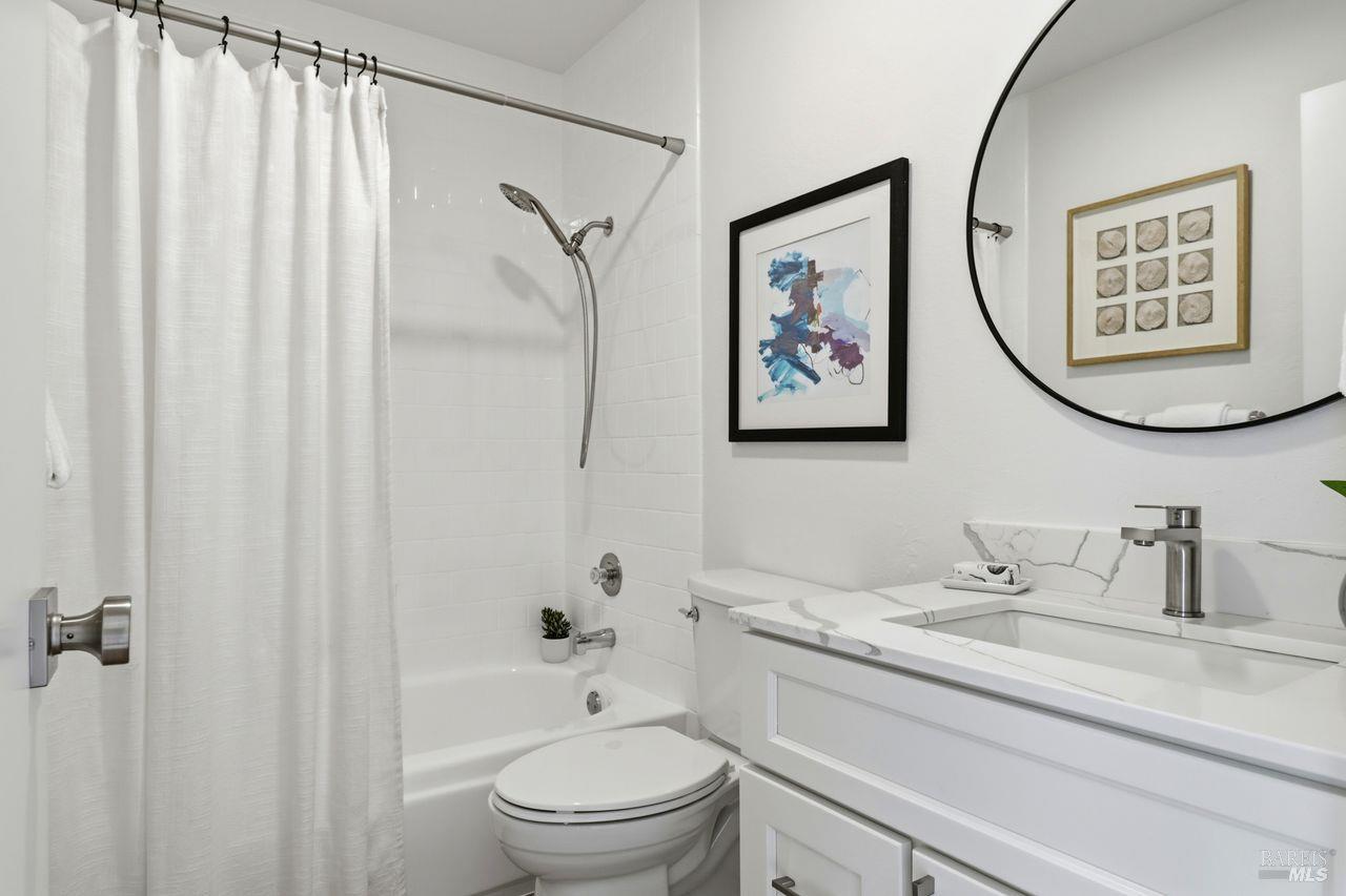 318 Sylvia Way San Rafael, CA 94903 - Photo 21 of 39 Hall bathroom featuring a shower-over-tub combination...