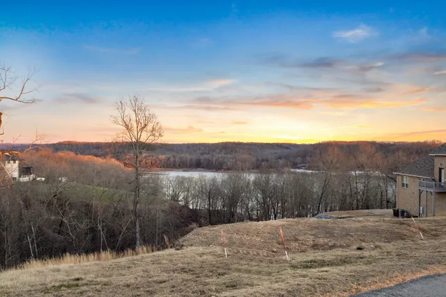 a view of a backyard of a house