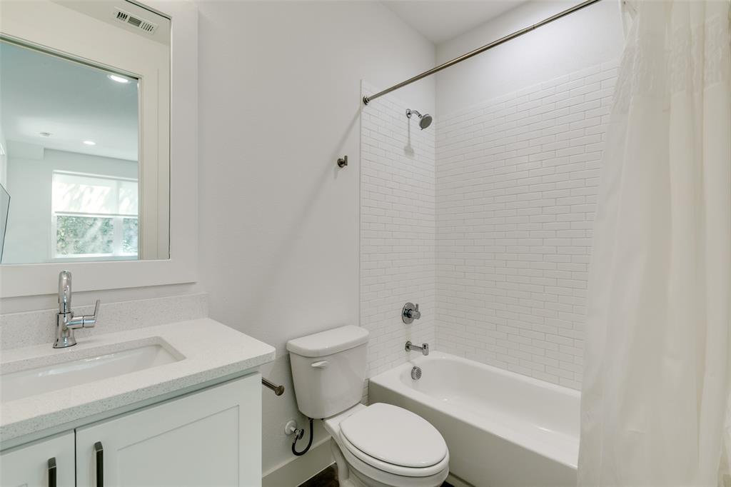 2908 Raleigh Street, Unit 204 Dallas, TX 75219 - Photo 23 of 25 a bathroom with a sink toilet and shower