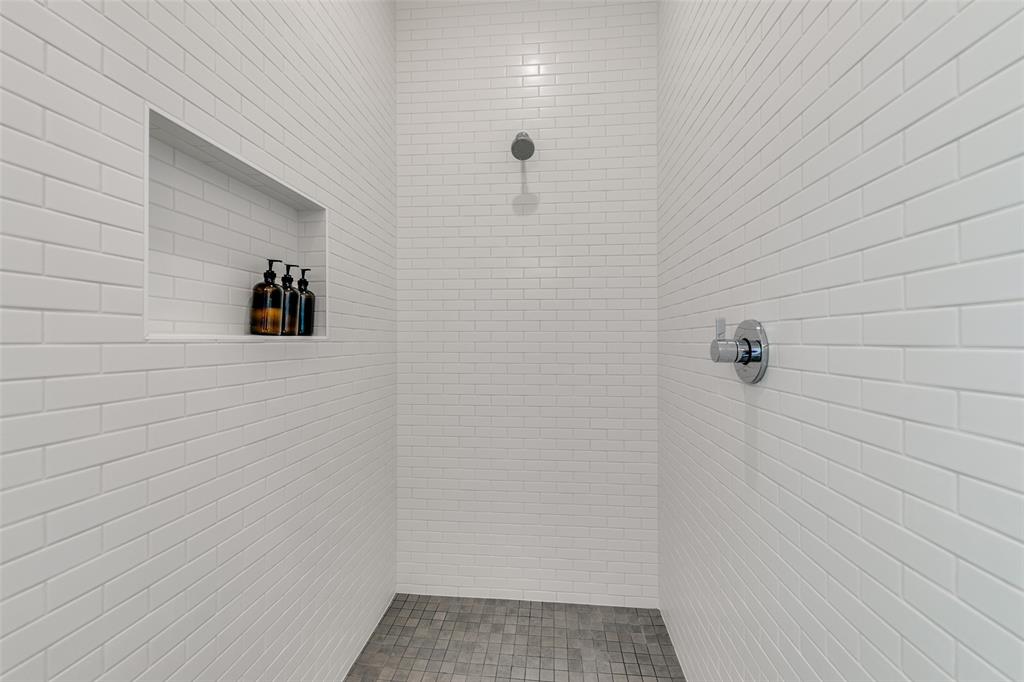 2908 Raleigh Street, Unit 204 Dallas, TX 75219 - Photo 25 of 25 a bathroom with a shower