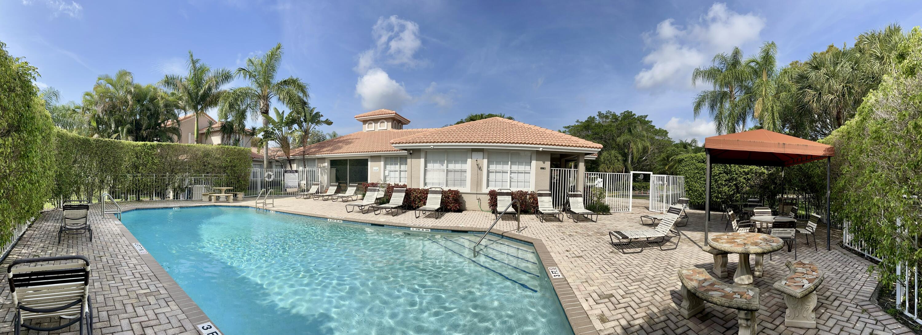 10253 Vía Hibiscus Boca Raton, FL 33428 - Photo 2 of 48 Community pool