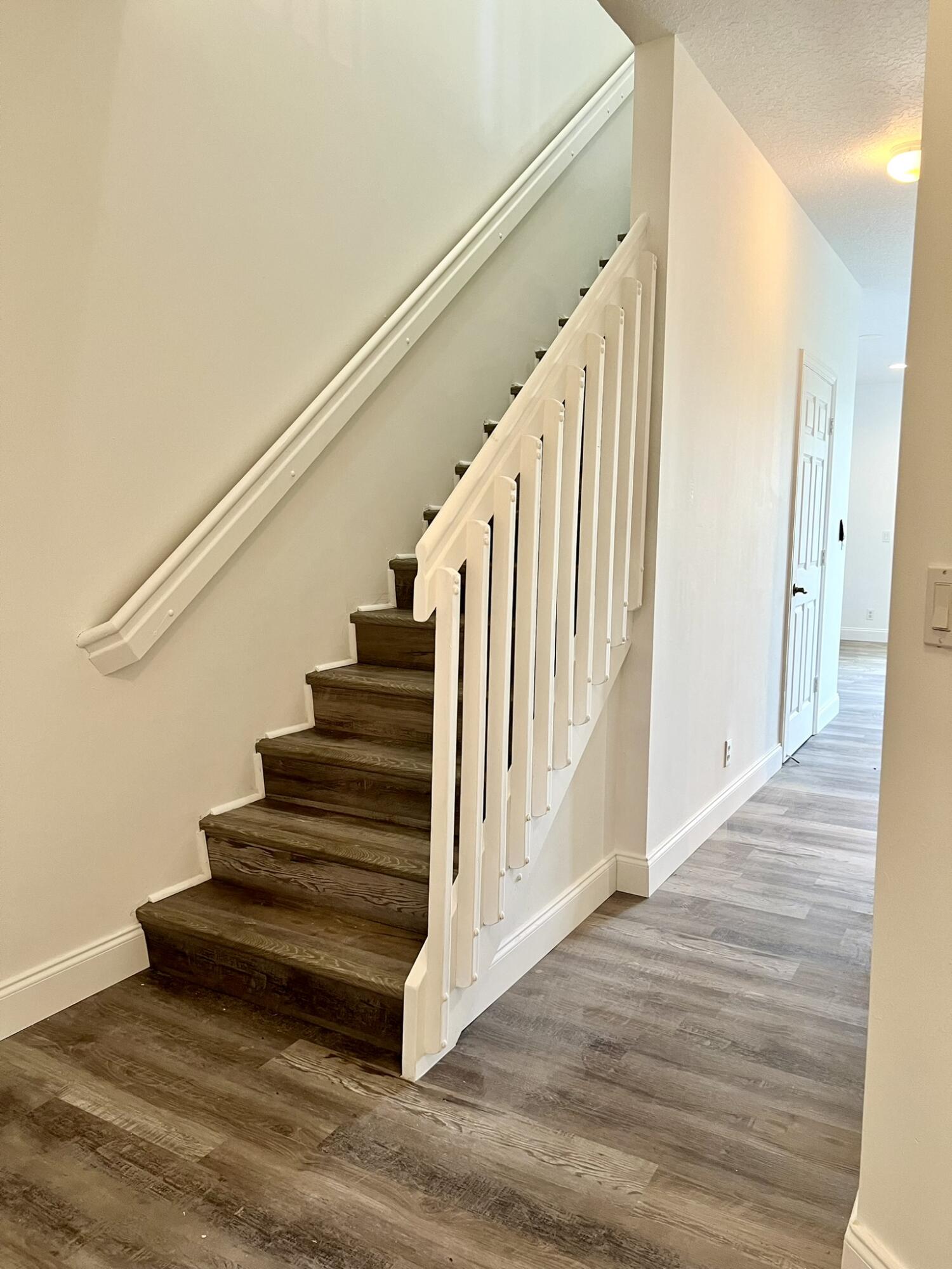 10253 Vía Hibiscus Boca Raton, FL 33428 - Photo 21 of 48 Stairs to bedrooms