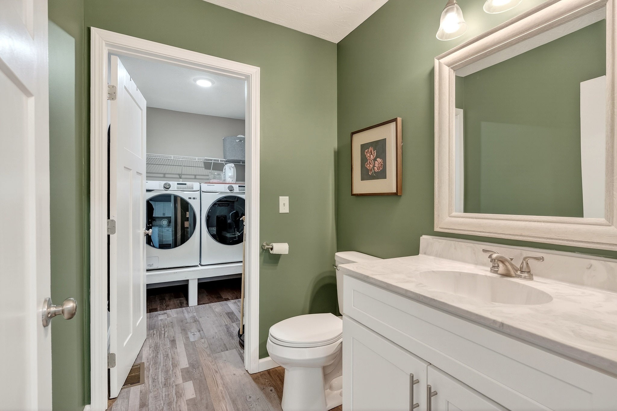 217 Peach Street Baxter, TN 38544 - Photo 11 of 39 a bathroom with a toilet sink and mirror