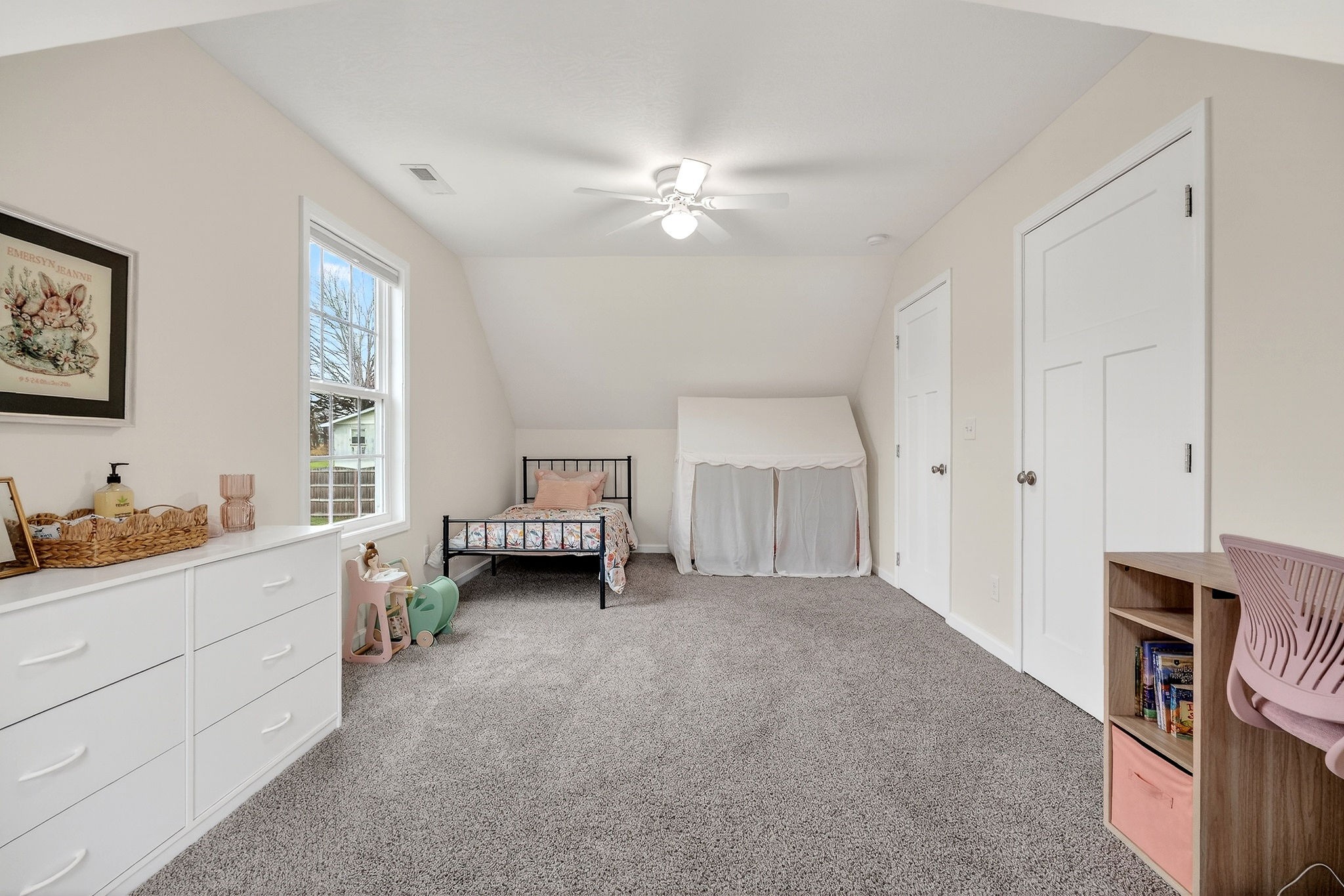 217 Peach Street Baxter, TN 38544 - Photo 20 of 39 a view of a bedroom with furniture and windows