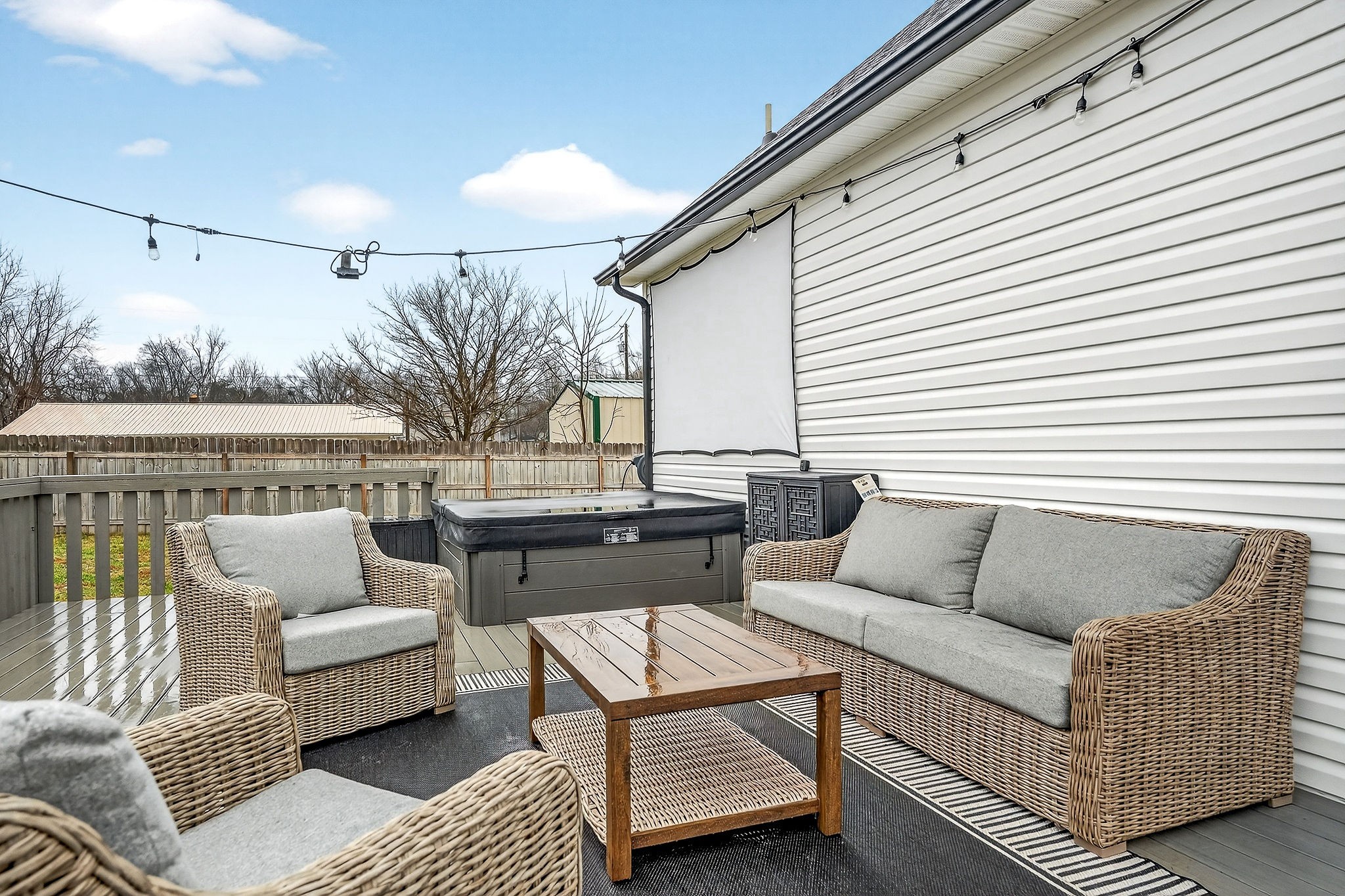 217 Peach Street Baxter, TN 38544 - Photo 30 of 39 a view of a roof deck with couches and potted plant