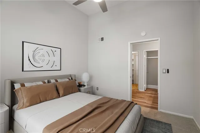 a bathroom with a sink double vanity and a mirror