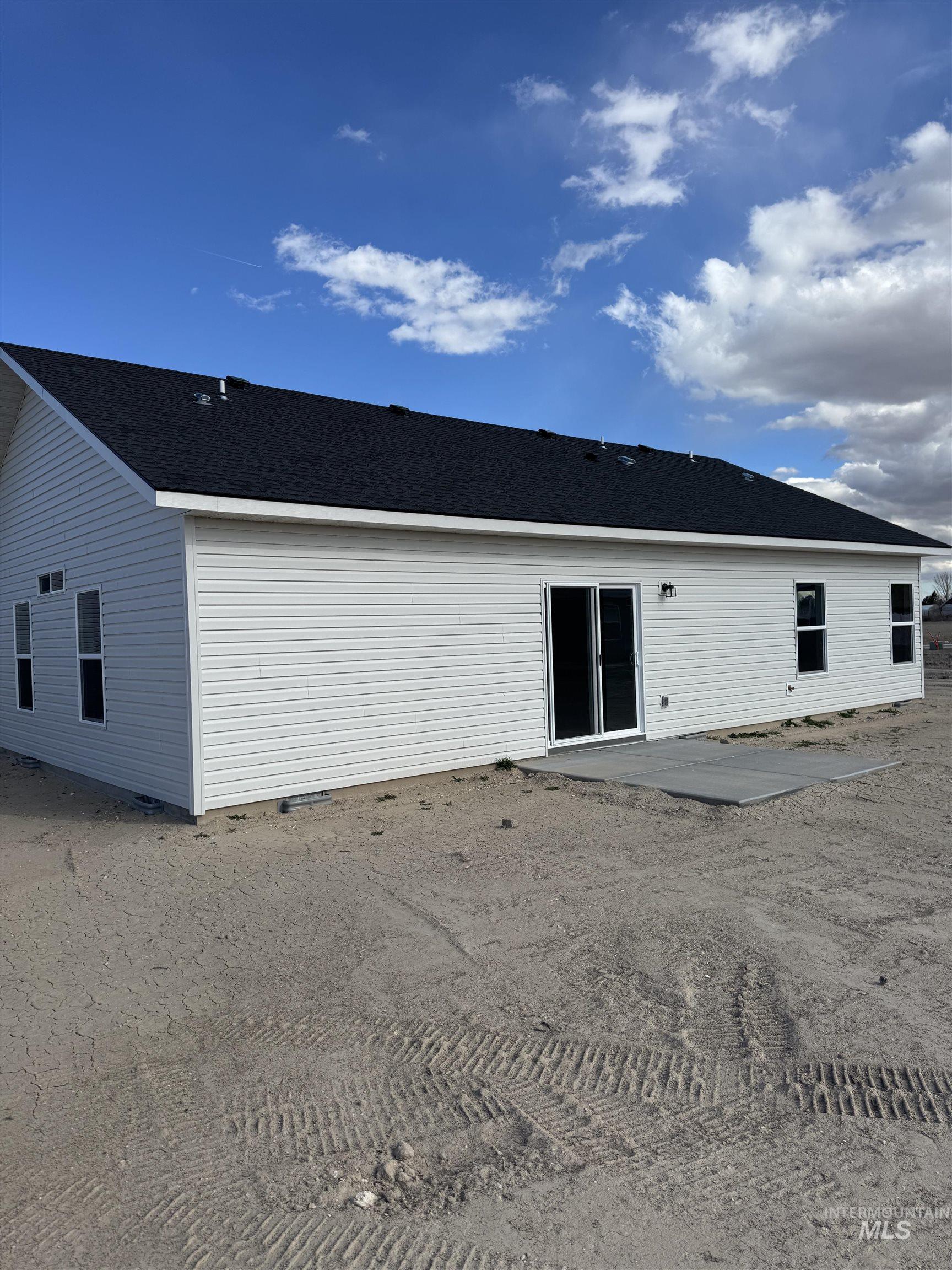 2064 Harrison Street South Twin Falls, ID 83301 - Photo 27 of 29 Back of house featuring a patio area