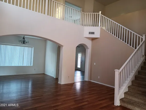 a view of entryway with wooden floor