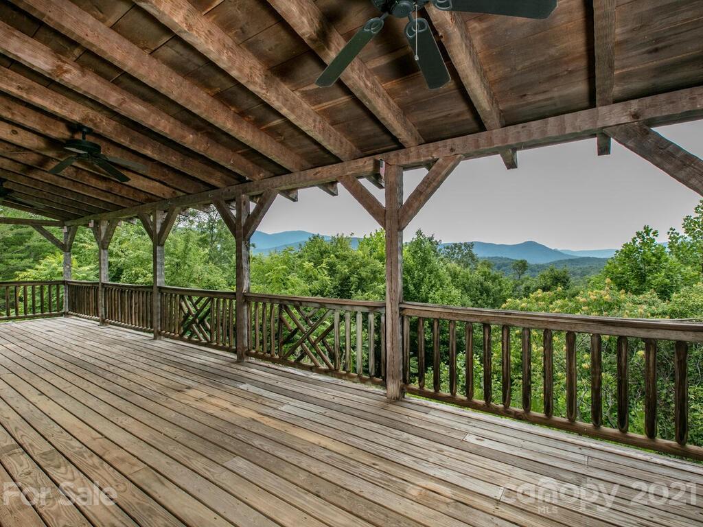 723 North Highland Road, Unit 9 10 11 Mill Spring, NC 28756 - Photo 1 of 46 a view of a wooden deck