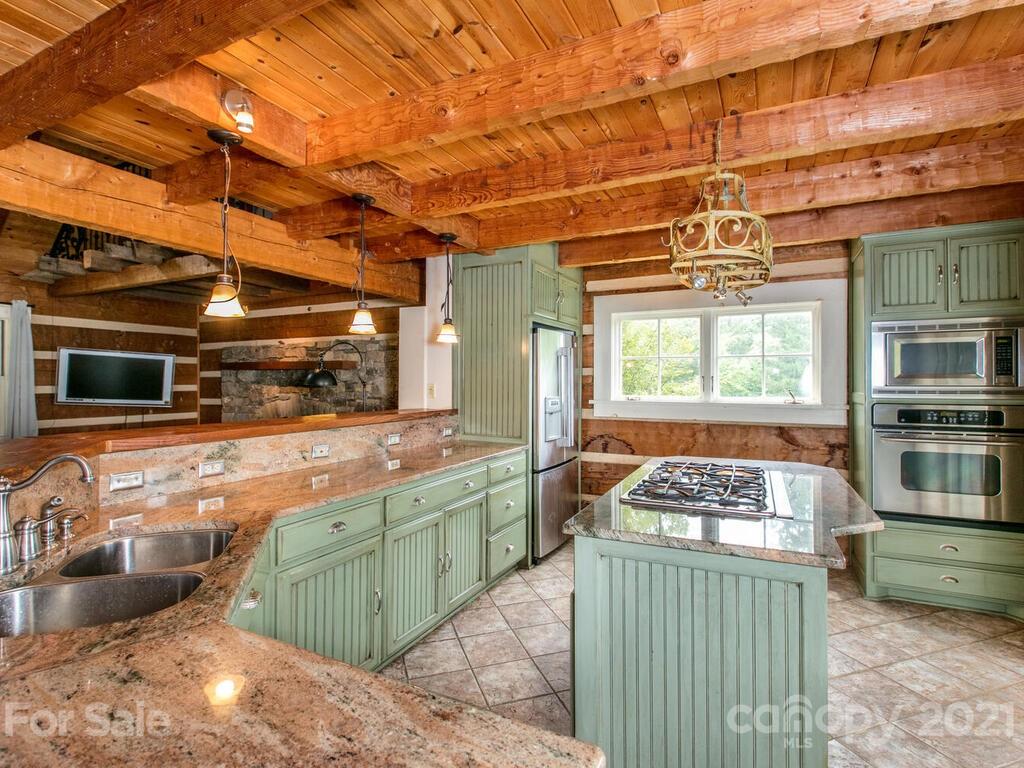 723 North Highland Road, Unit 9 10 11 Mill Spring, NC 28756 - Photo 20 of 46 a kitchen with lots of counter top space