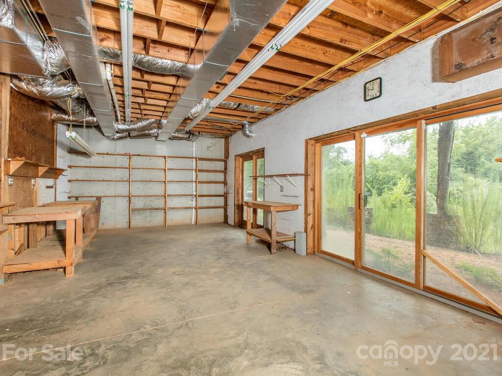 723 North Highland Road, Unit 9 10 11 Mill Spring, NC 28756 - Photo 26 of 46 a view of a car garage