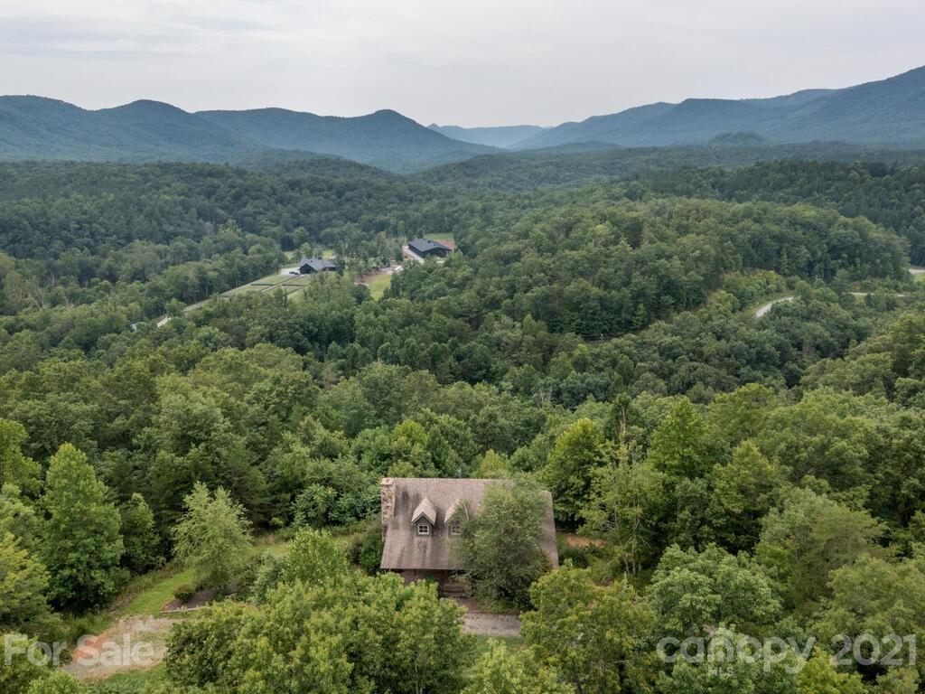 723 North Highland Road, Unit 9 10 11 Mill Spring, NC 28756 - Photo 28 of 46 an aerial view of residential house with green space