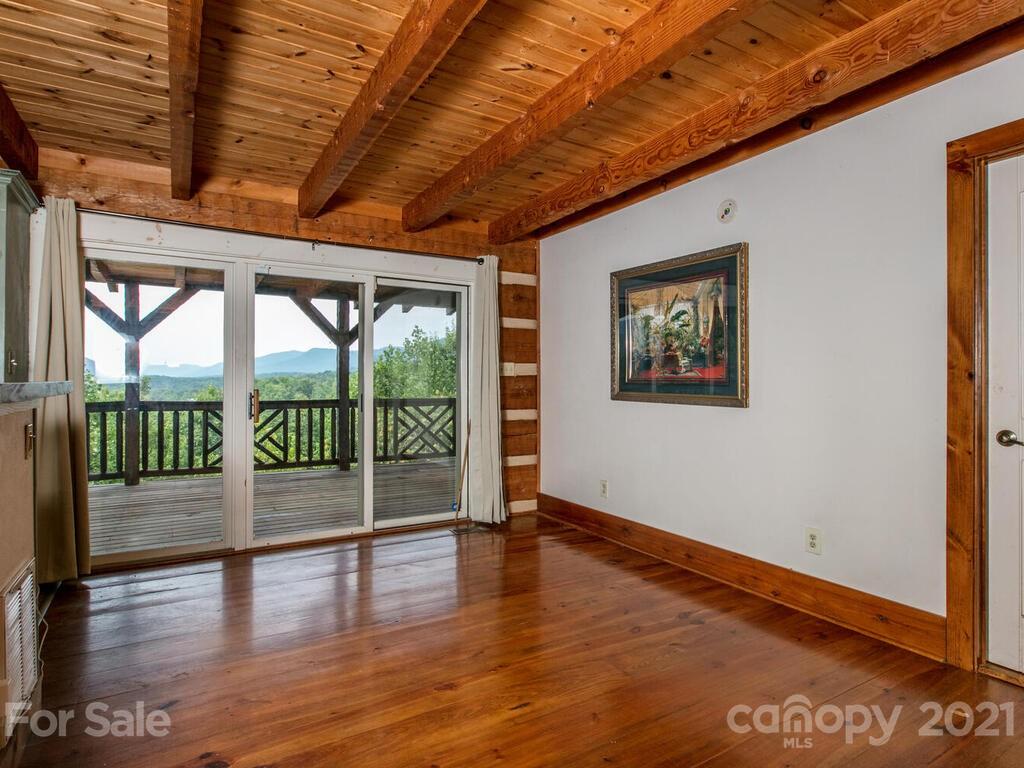 723 North Highland Road, Unit 9 10 11 Mill Spring, NC 28756 - Photo 29 of 46 a view of empty room with wooden floor