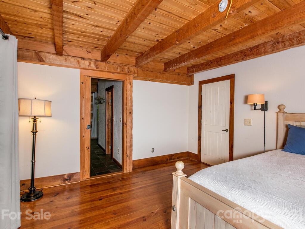 723 North Highland Road, Unit 9 10 11 Mill Spring, NC 28756 - Photo 32 of 46 a view of a room with wooden floor