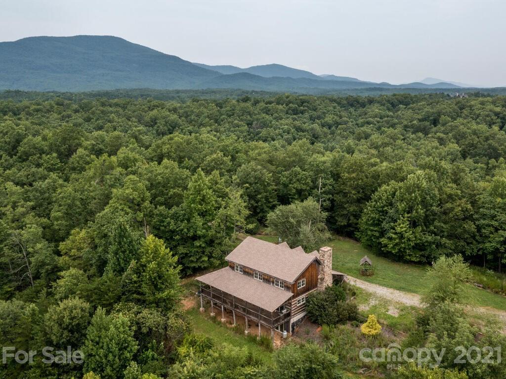 723 North Highland Road, Unit 9 10 11 Mill Spring, NC 28756 - Photo 35 of 46 a view of a back yard