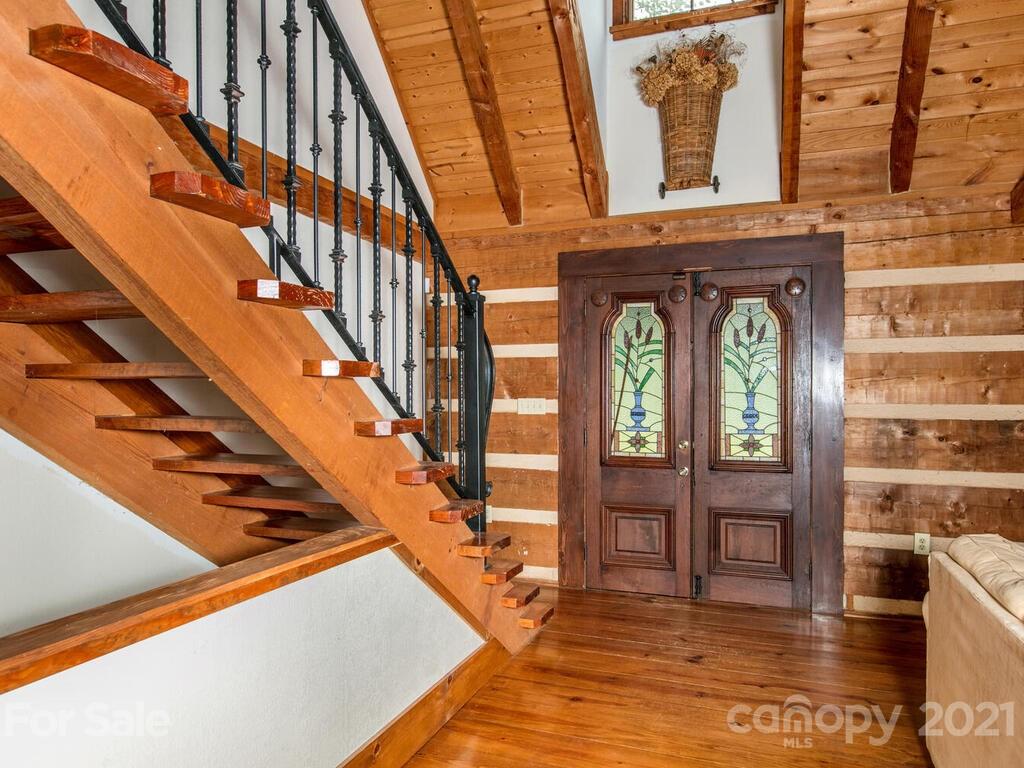 723 North Highland Road, Unit 9 10 11 Mill Spring, NC 28756 - Photo 10 of 46 a view of an entryway with wooden floor