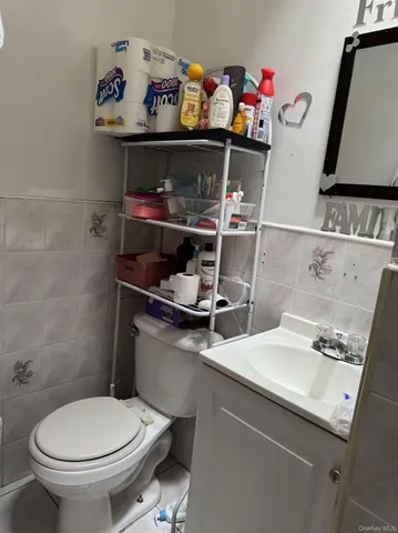 a room with a wooden floor and shoes