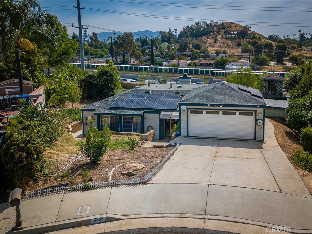 a aerial view of a house with a garden