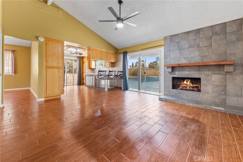 3208 Gibraltar Dr. Riverside, CA 92506 - Photo 11 of 37 a living room with furniture and a fireplace