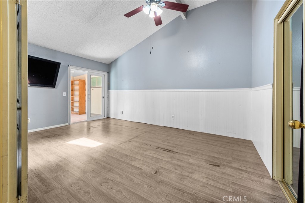 3208 Gibraltar Dr. Riverside, CA 92506 - Photo 15 of 37 wooden floor in an empty room with a window