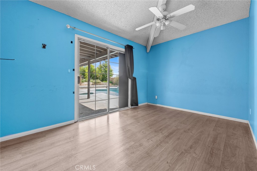 3208 Gibraltar Dr. Riverside, CA 92506 - Photo 22 of 37 wooden floor in an empty room with a window